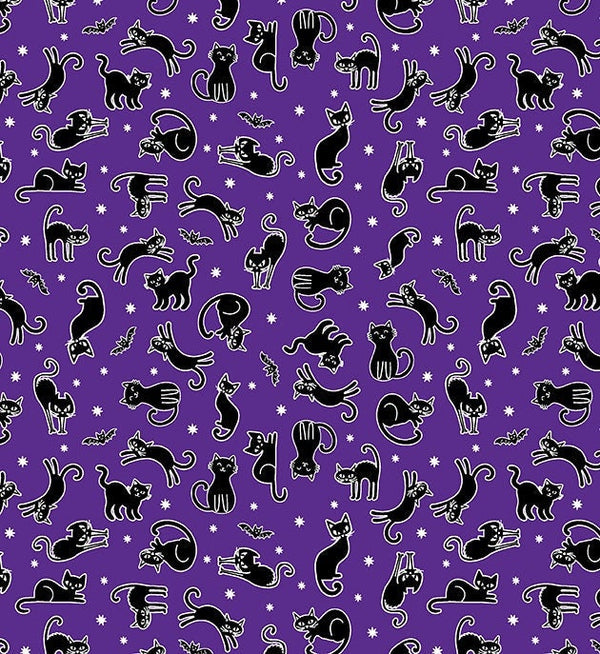 small black cats and bats on purple fabric with glow in dark outlines and stars