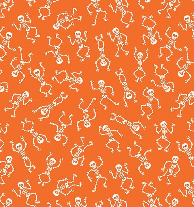 glow in dark dancing skeletons on orange fabric